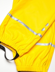 LEGO kidswear - PUCK 101 - RAIN PANTS - spodnie przeciwdeszczowe - yellow - 3