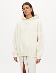 Les Coyotes De Paris - Oversized logo hoodie - sweatshirts en hoodies - off-white - 2