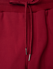 Les Deux - Sterling Track Pants - sweatpants - burnt red/ivory - 4