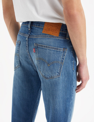 LEVI´S Men - 511 SLIM NICE AND SIMPLE - kitsad teksad - med indigo - worn in - 6
