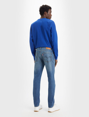 LEVI´S Men - 512 SLIM TAPER HOT N WARM - slim fit jeans - med indigo - worn in - 4