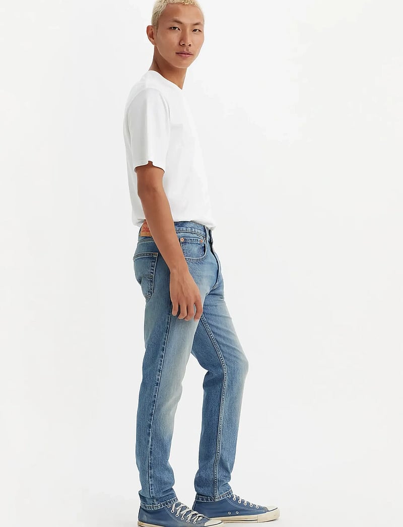 Levi's® - 512 SLIM TAPER AMPED UP ADV - slim fit jeans - med indigo - worn in - 0