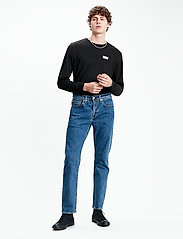 LEVI´S Men - 502 TAPER STONEWASH STRETCH T2 - tapered jeans - med indigo - flat finish - 0