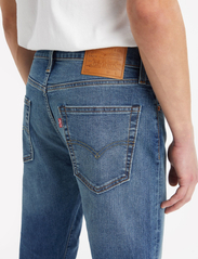 LEVI´S Men - 502 TAPER HOT N WARM - tapered jeans - med indigo - worn in - 6