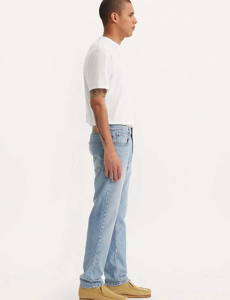 Levi's® - 502 TAPER FEELIN FREE - med indigo - worn in - 0