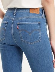 LEVI´S Women - 720 HIRISE SUPER SKINNY Z0736 - skinny jeans - med indigo - worn in - 6