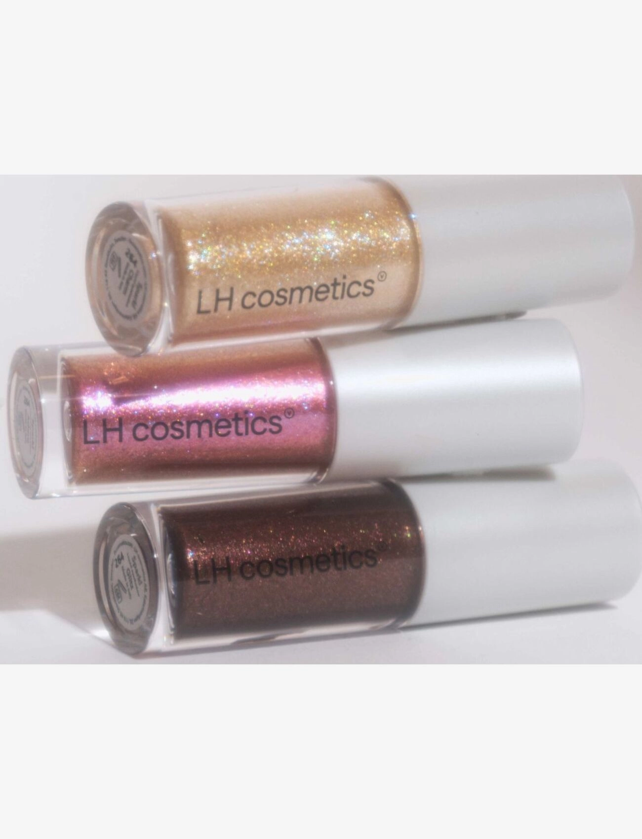 LH Cosmetics - Sparkl liquid eyeshadow & topper - bliv klar til date night - charm gold base with gold & blue glitter - 3