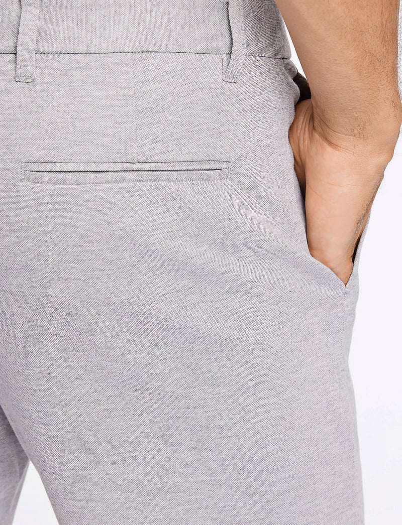 Lindbergh - Superflex knitted cropped pant - vabaaja püksid - lt grey mix - 5