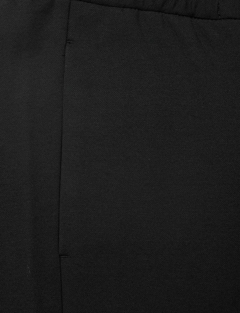 Lindbergh - Superflex relaxed fit pants - vabaaja püksid - black - 2