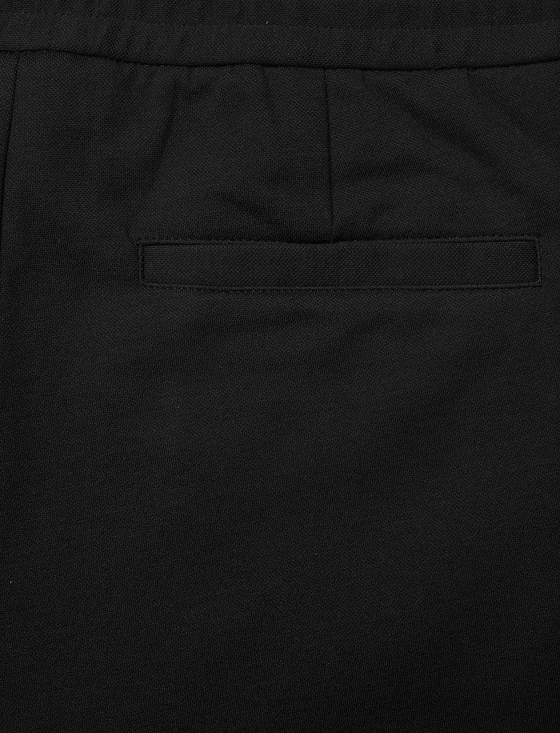 Lindbergh - Superflex relaxed fit pants - vabaaja püksid - black - 4