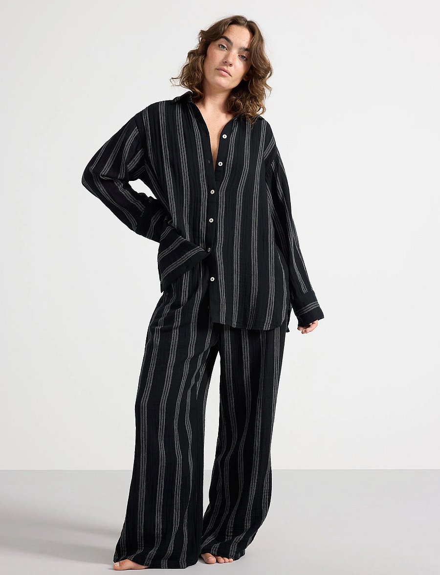 Lindex - Pyjama trousers - hosen mit weitem bein - black - 0