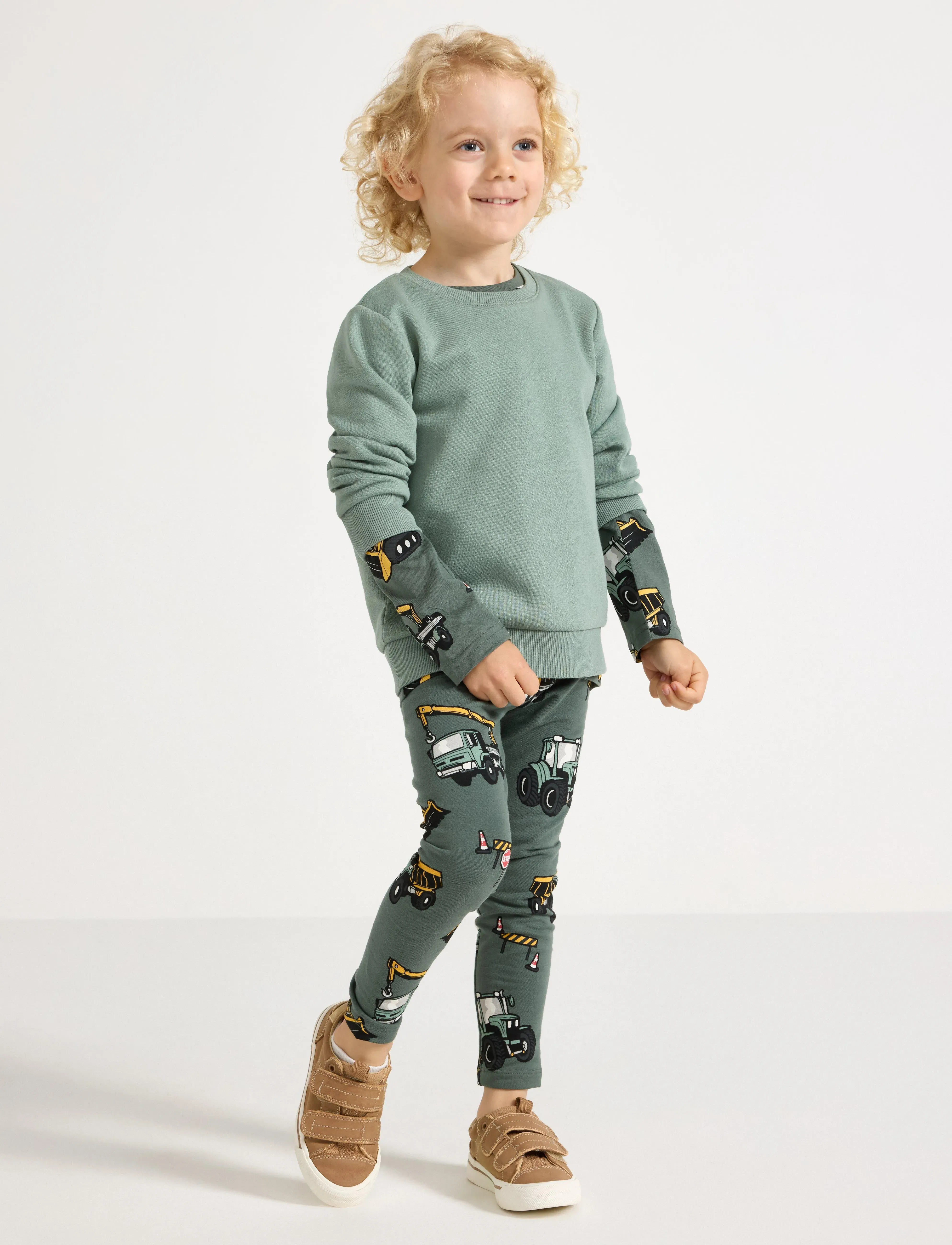 Lindex Leggings Working vehicles AOP - Leggings - DUSTY GREEN / green