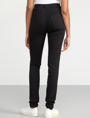 Lindex - Trousers denim Vera stay black - slim jeans - black - 4