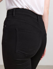Lindex - Trousers denim Vera stay black - jeans slim - black - 4