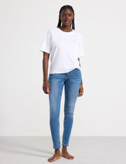Lindex - Trousers denim Tova Soft blue - slim fit jeans - denim blue - 6