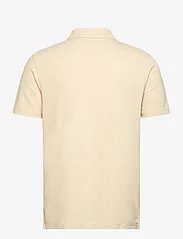 Lyle & Scott Sport - Monogram Jacquard Polo Shirt - short-sleeved polos - x183 sand dune - 1