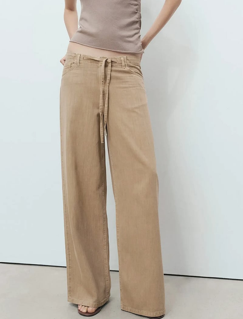Mango - Wide leg denim trousers with belt - brede jeans - lt pastel brown - 0