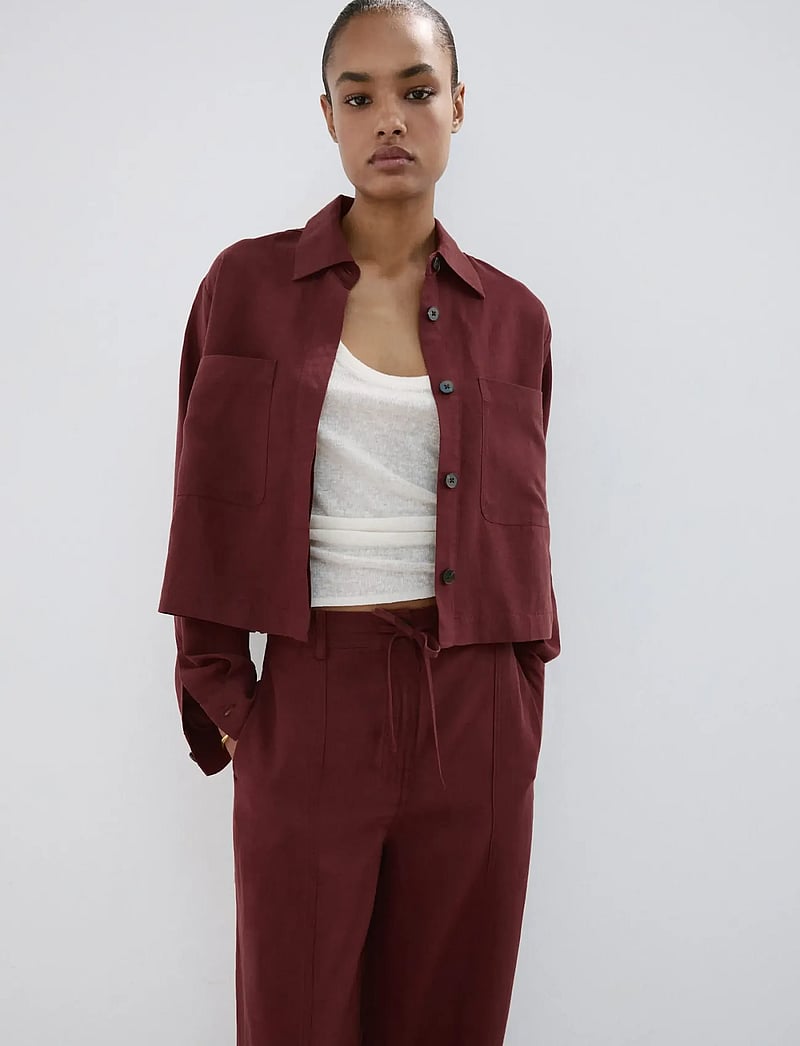 Mango - Straight-fit lyocell trousers - bukser med brede ben - medium orange - 0
