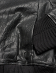 Mango - Leather jacket with elasticated hem - kevättakit - black - 3