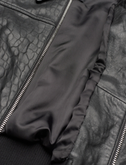 Mango - Leather jacket with elasticated hem - kevättakit - black - 4