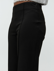 mbyM - Uma-M - bukser med brede ben - black - 4