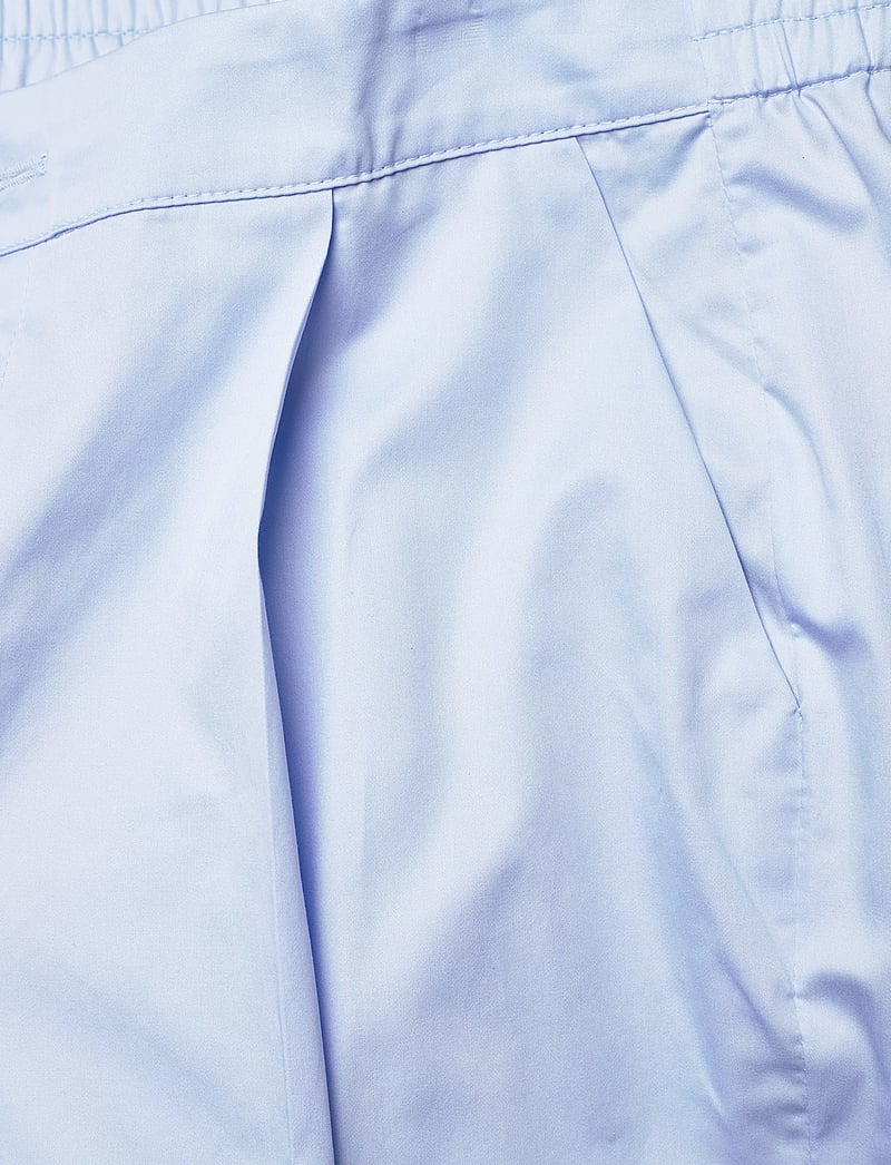 Naja Lauf - NICO PANTS COTTON SATEEN - straight leg trousers - light blue - 2
