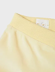 name it - NKFDEBBIE VEL SHORTS - sweat shorts - pastel yellow - 2