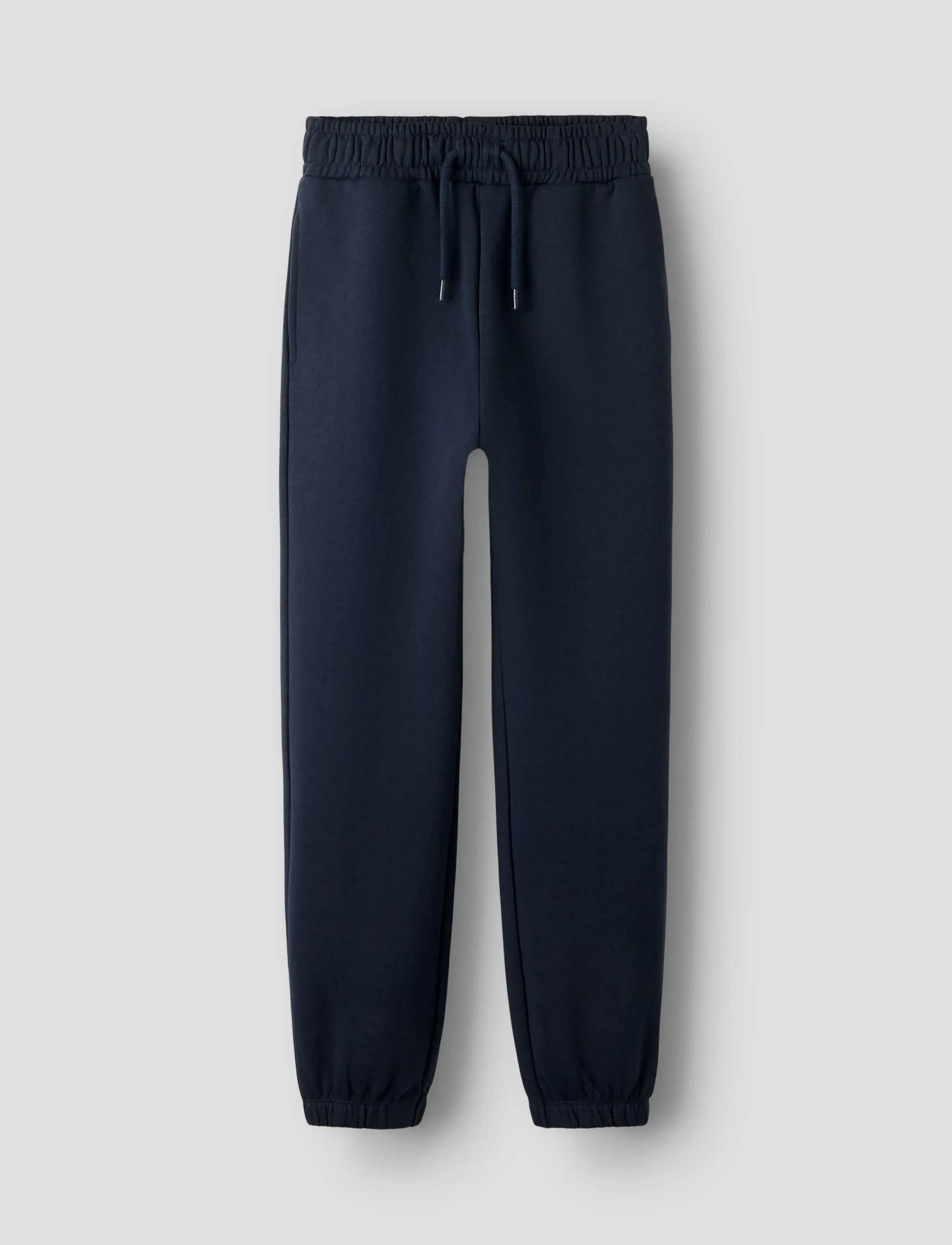 name it NKMOMAN NREG SWE PANT BRU - Trousers - DARK SAPPHIRE / navy
