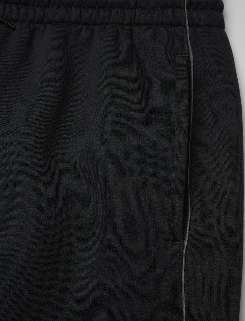 New Balance - Linear Graphic Fleece Short 7" - hosen - black - 4