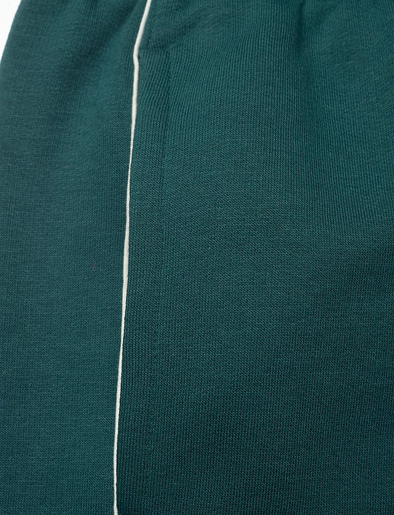New Balance - Linear Graphic Fleece Short 7" - püksid - medusa green - 2