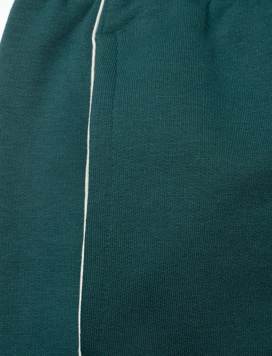 New Balance - Linear Graphic Fleece Short 7" - nederdelar - medusa green - 2
