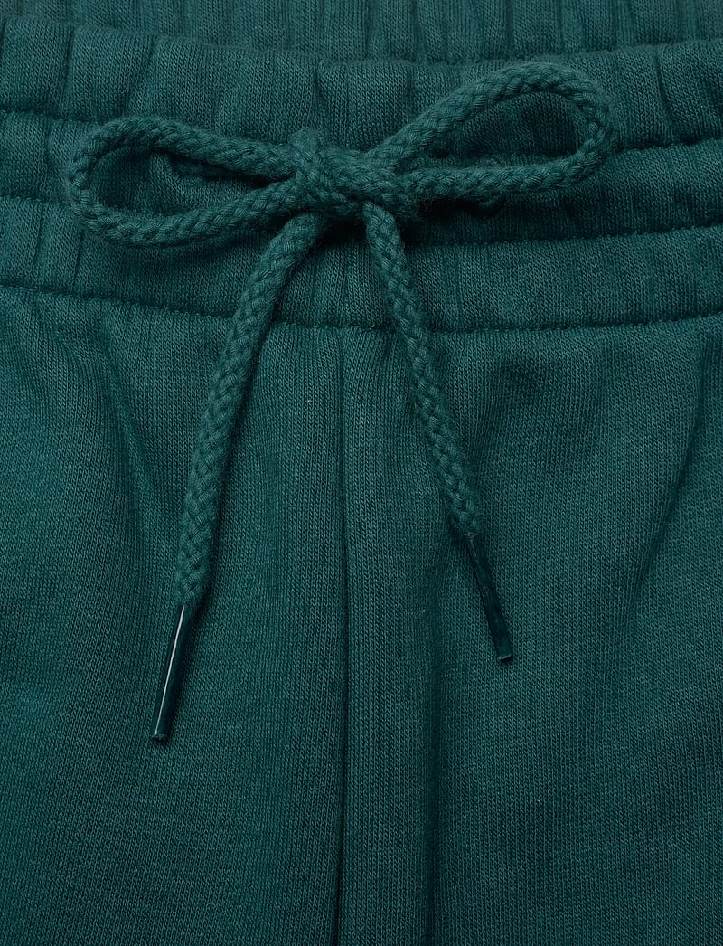 New Balance - Linear Graphic Fleece Short 7" - püksid - medusa green - 3