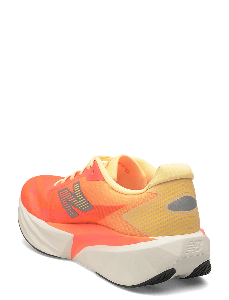 New Balance - New Balance FuelCell Rebel v5 - löparskor - tangerine heat - 2