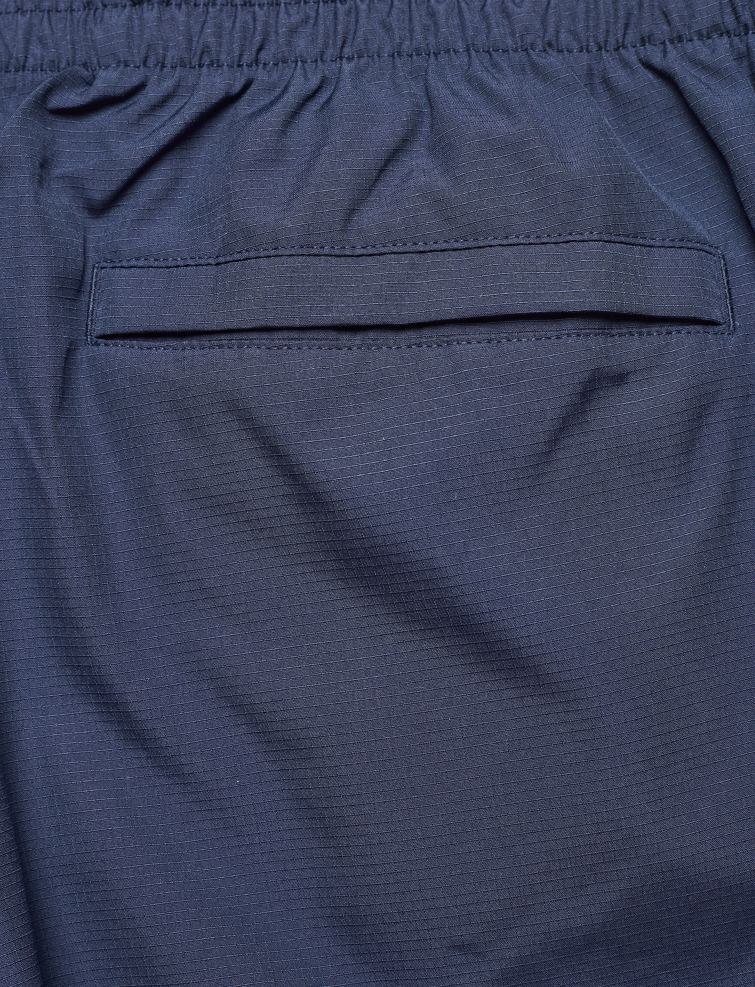 New Balance - NB ATHLETICS WIND PANT - natural indigo - 5