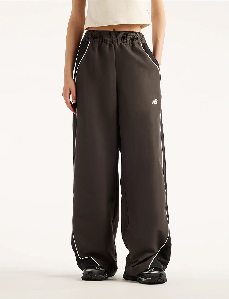 New Balance - Trackside Woven Pant - trainingshosen - black cement - 0