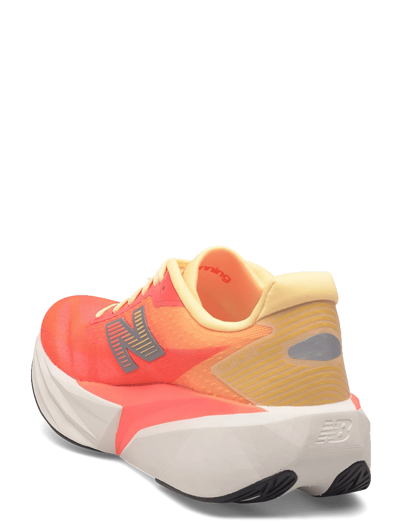 New Balance - New Balance FuelCell Rebel v5 - jooksujalatsid - tangerine heat - 2