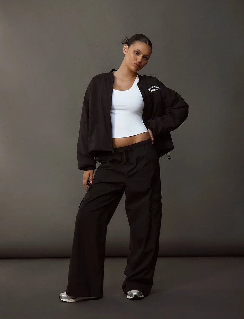 New Balance - Woven Cargo Pant - trainingshosen - black - 0