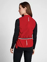 Newline - WOMENS CORE BIKE GILET - puffer vests - tango red - 6