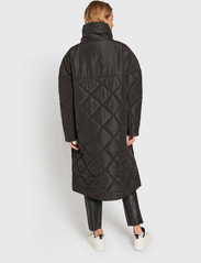 NORR - Alma slit quilted jacket - kevättakit - black - 7