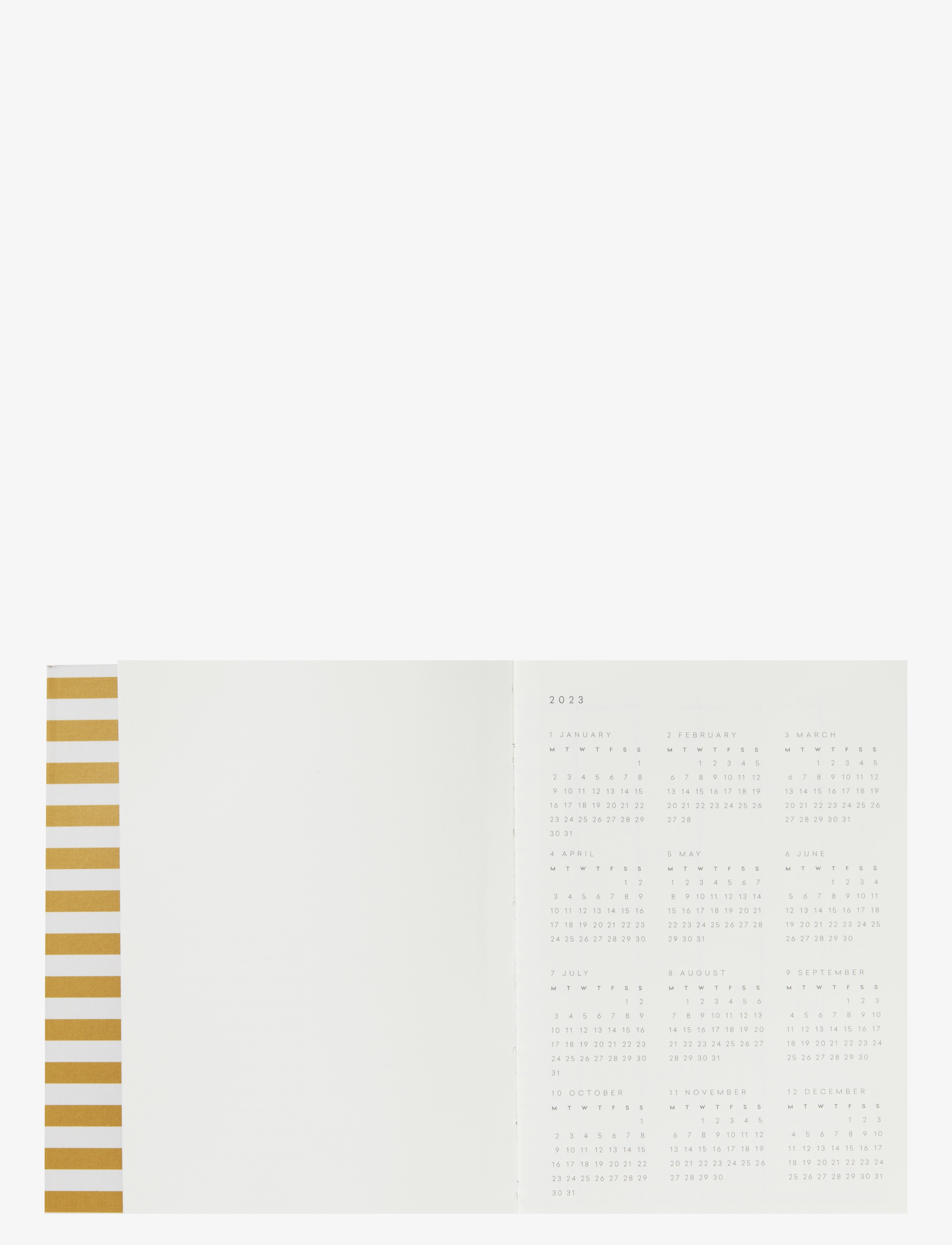 Notem - Alva - annual calendar 2023 (A6) - kalendrid ja märkmikud - ochre stripe - 2