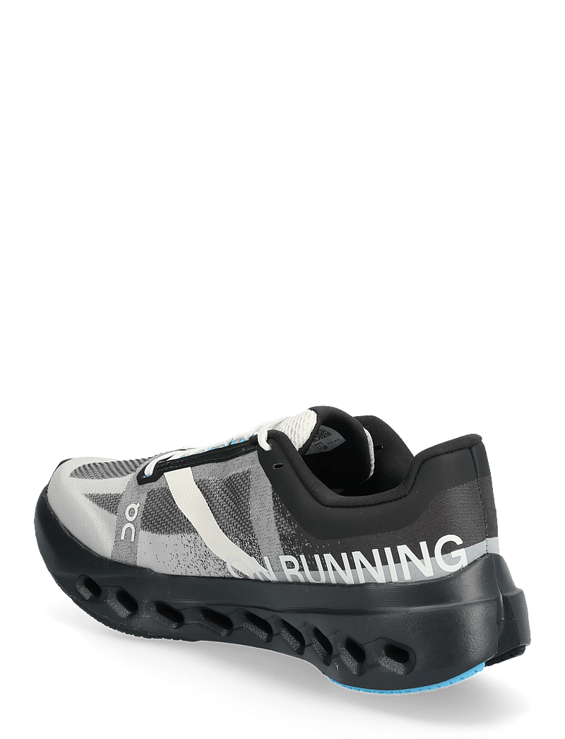 On - Cloudsurfer Next - jooksujalatsid - black | dew - 2