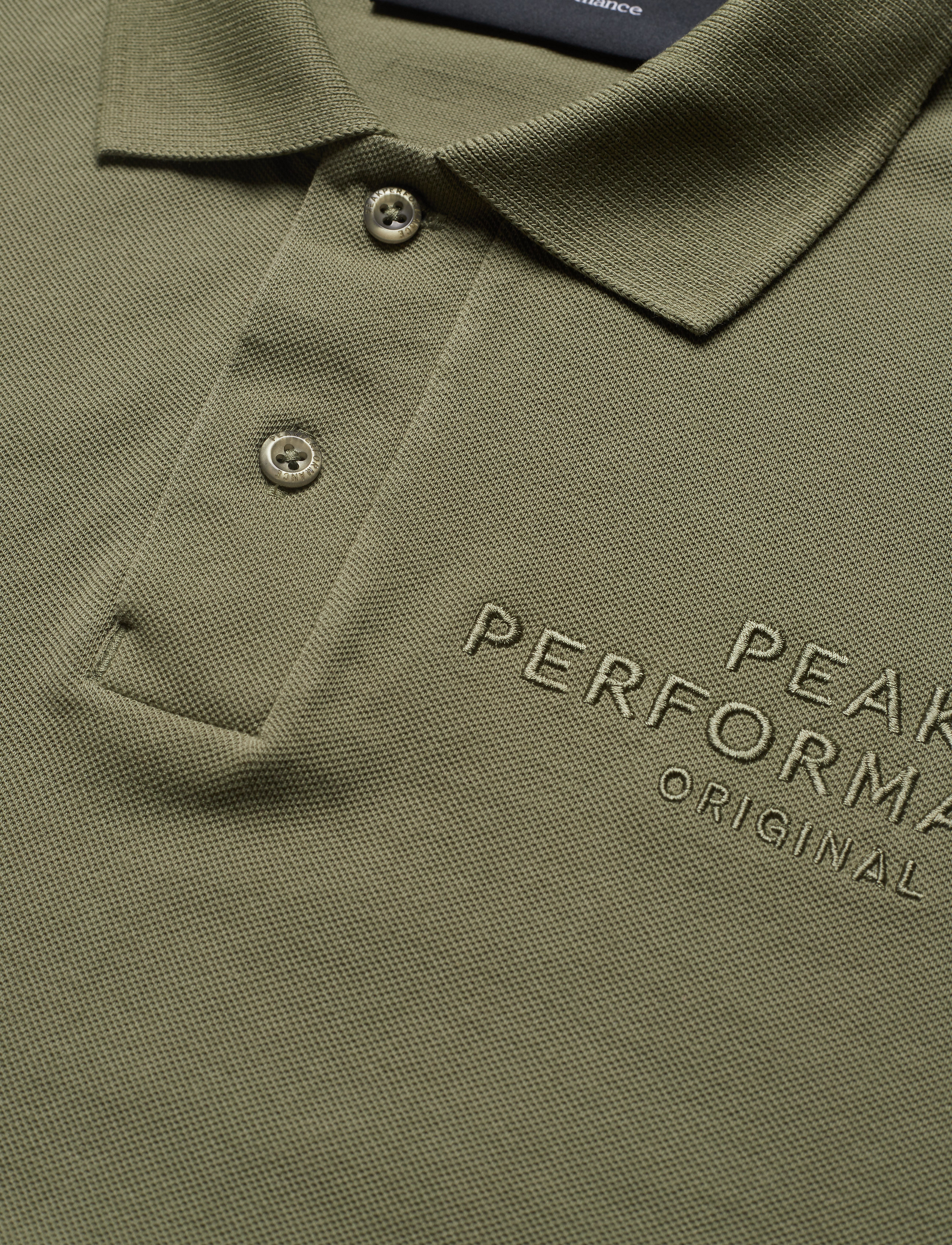 Peak Performance - M ORIG PIQ - leaflet green - 2