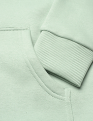 Peak Performance - W Logo Hood Sweatshirt - vahekihina kantavad jakid - delta green - 3