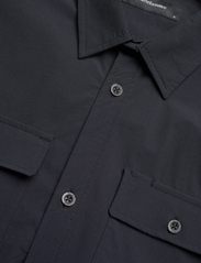 Peak Performance - M Stretch Shirt-BLACK - tavalised t-särgid - black - 2