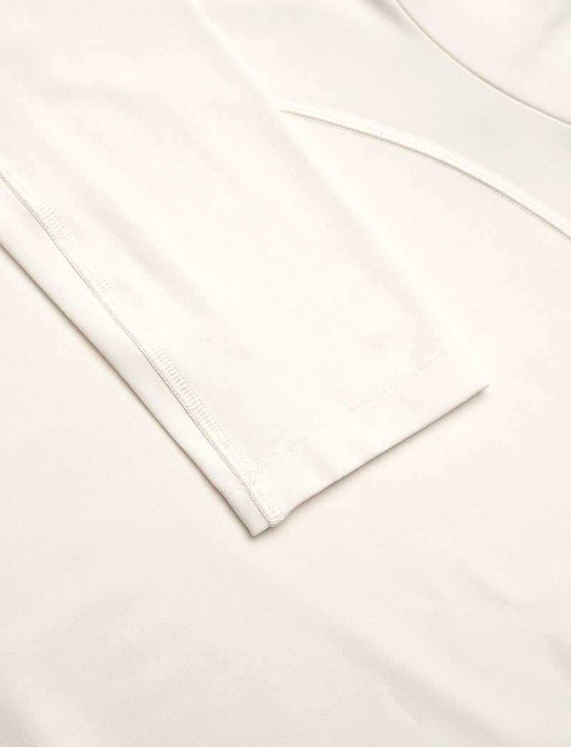 PUMA Golf - W Lucy LS Mockneck - alussärgid ja t-särgid - warm white - 2