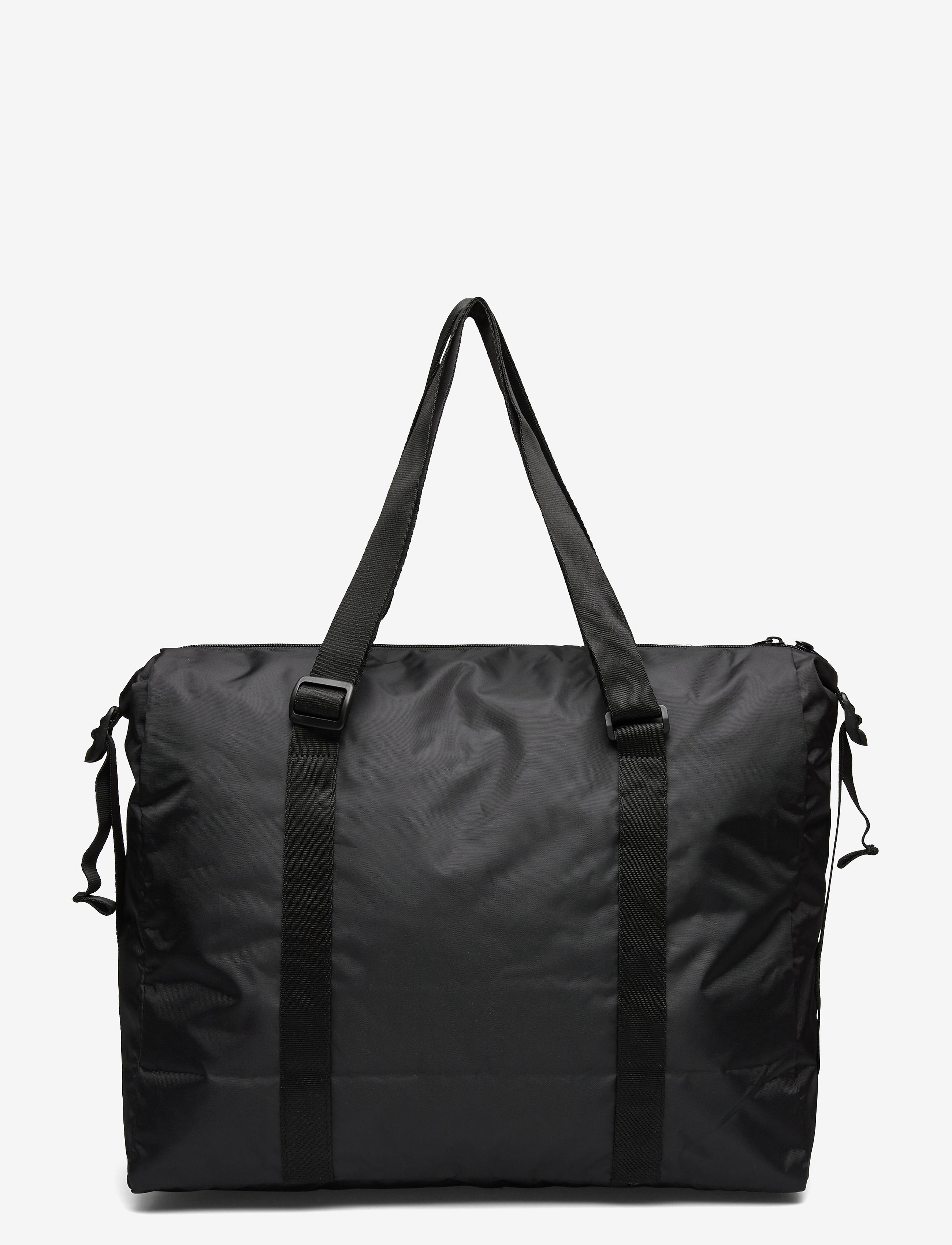 PUMA - WMN Core Seasonal Duffle Bag - puma black-aop - 1