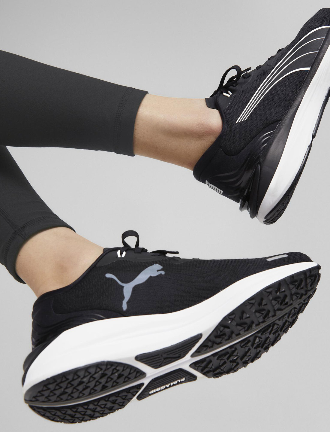 Puma running shoes black top and white