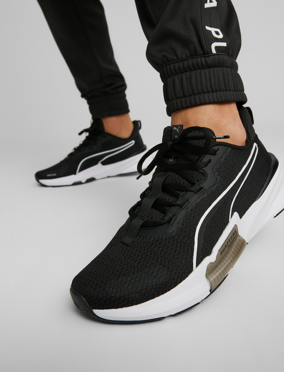 Puma black gym sales shoes