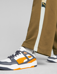 PUMA - Slipstream lth - sportiska stila apavi ar pazeminātu potītes daļu - puma white-pumpkin pie - 1