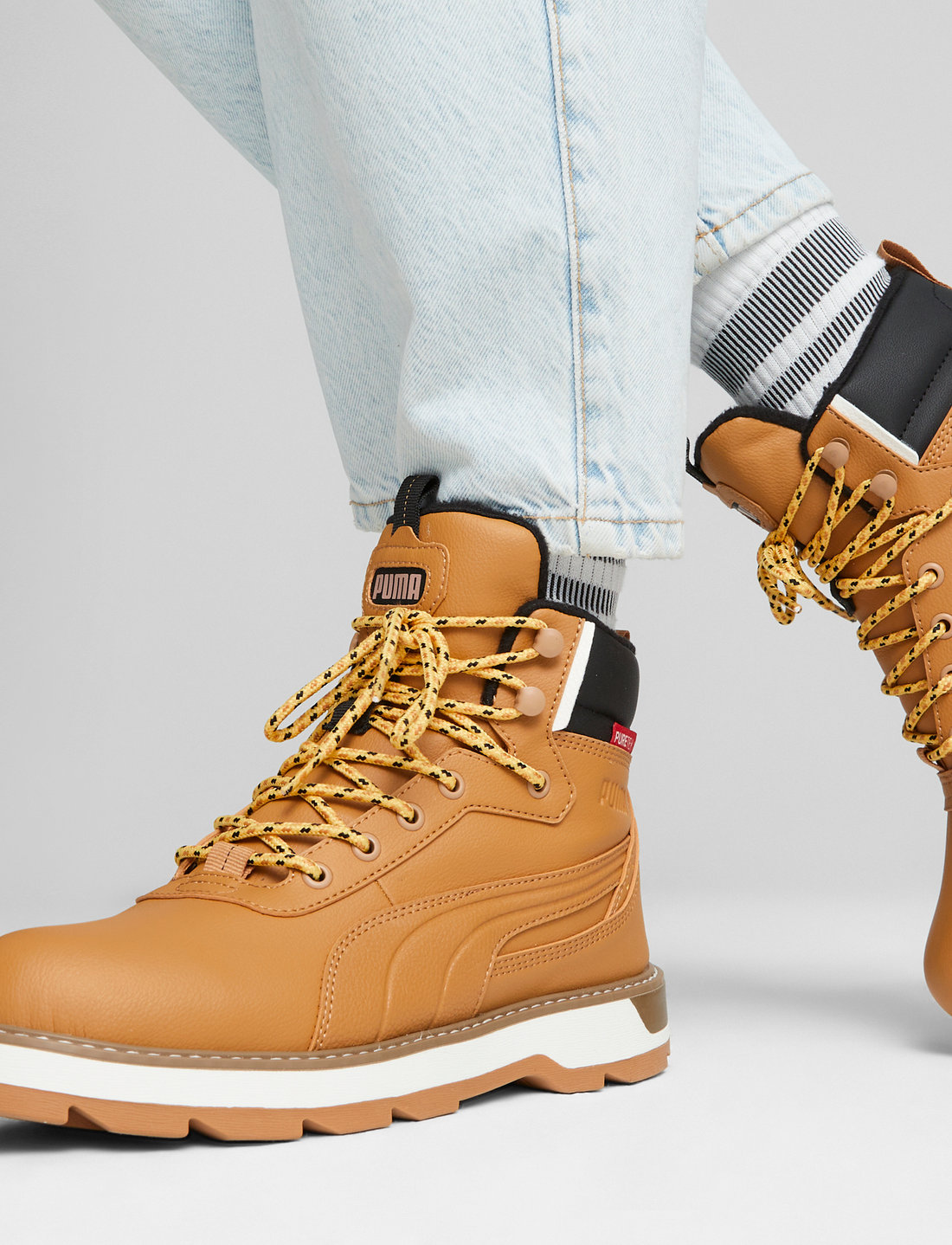 All gold top high top pumas